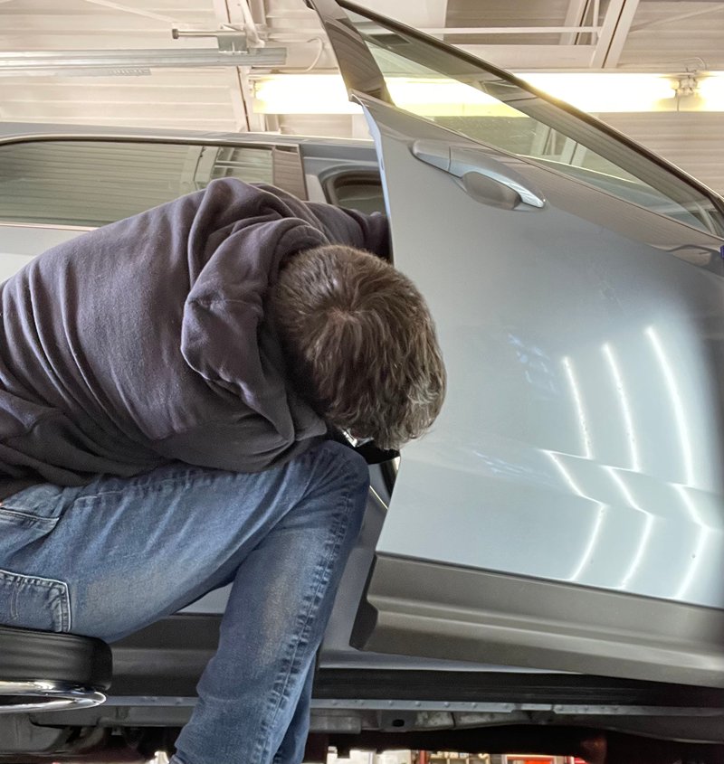 Professional auto dent repair process in Bethlehem PA showing insurance approved work